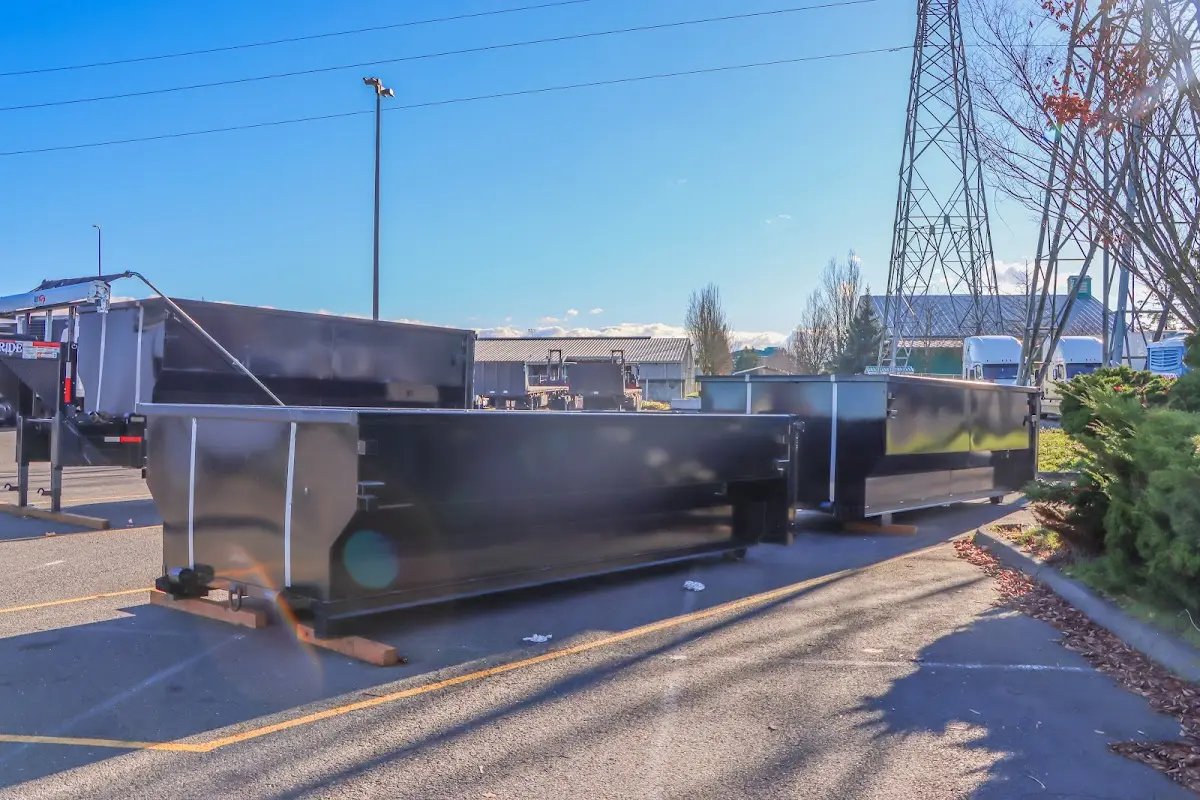 Roll-off dumpster ready for waste disposal at job site for 15 Yard Dumpster Rental in Medina